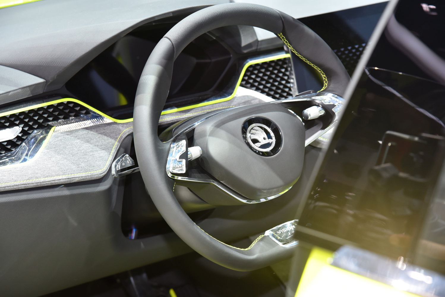 Innovative steering wheel with futuristic dashboard design.
