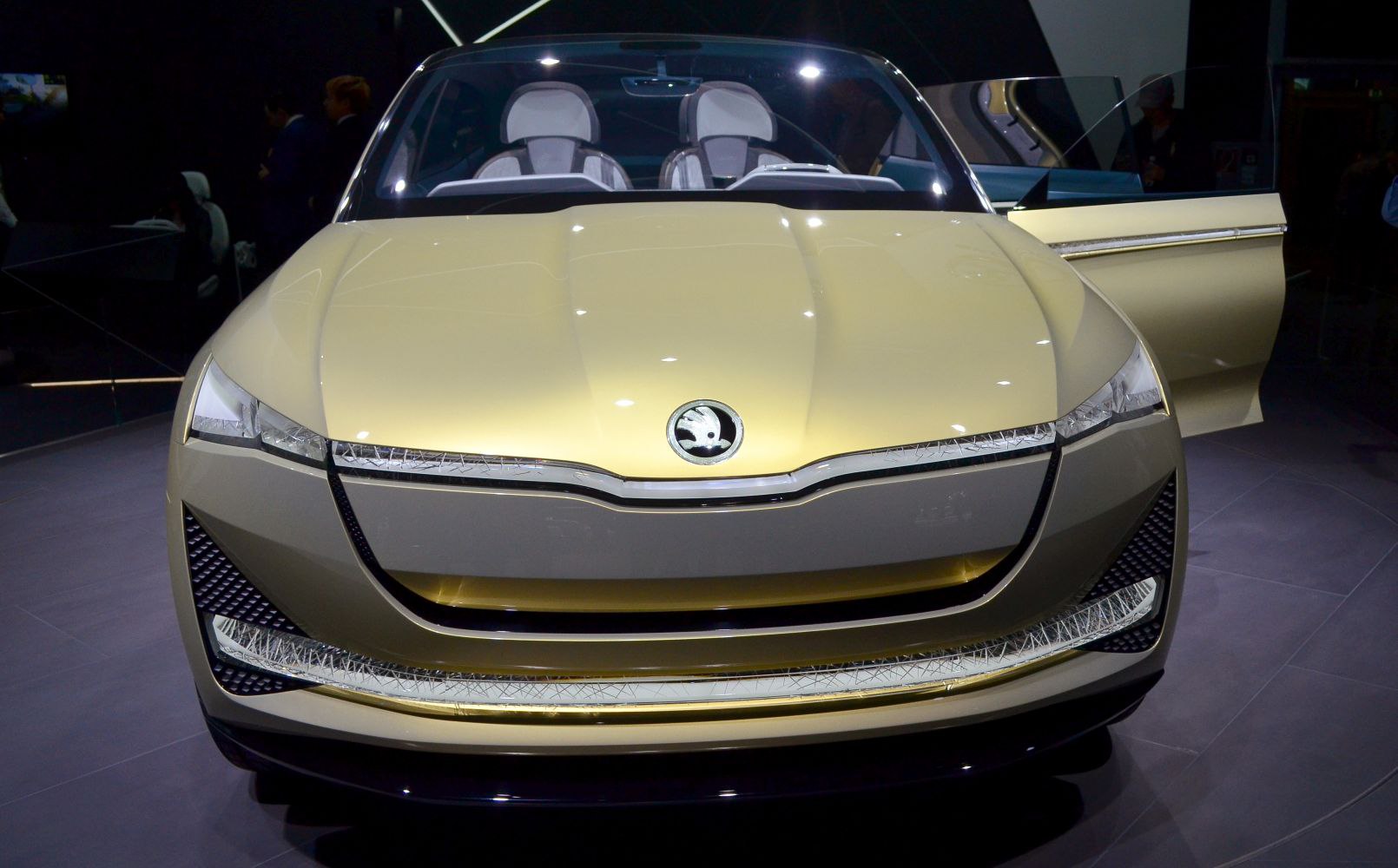 Futuristic front fascia with LED lights and open door.