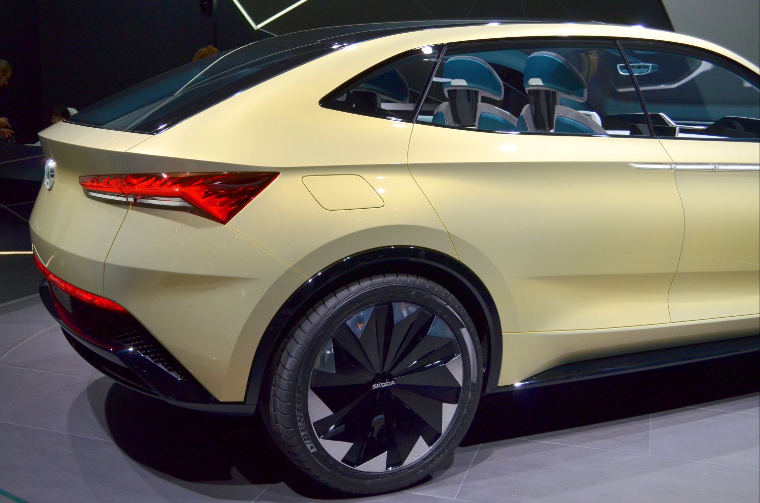 Sharp rear taillights and futuristic alloy wheels on concept car rear side