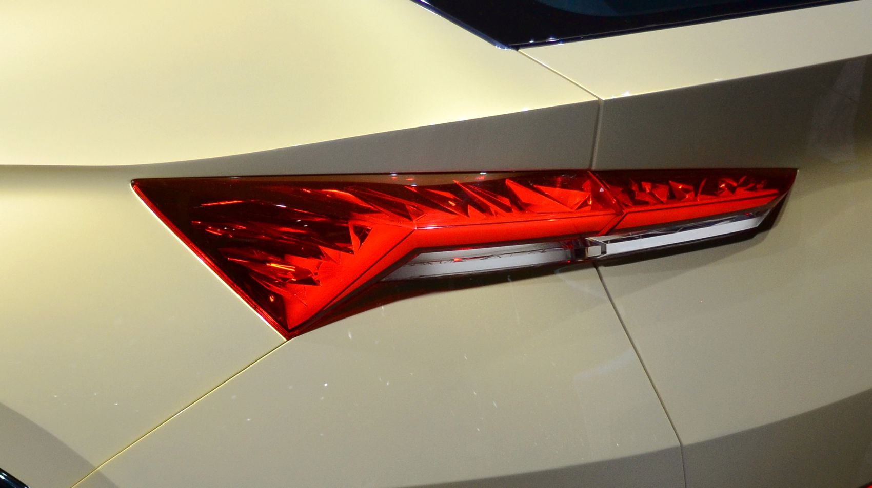 Angular red rear light with sharp, geometric lines