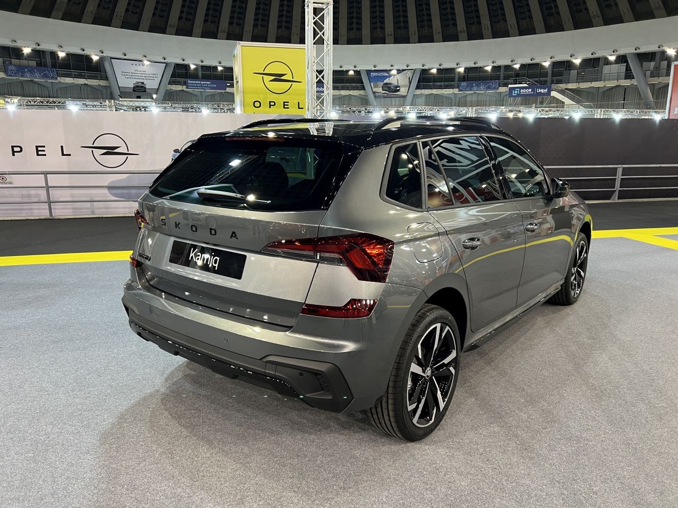 Rear and side view with sharp taillights and alloy wheels