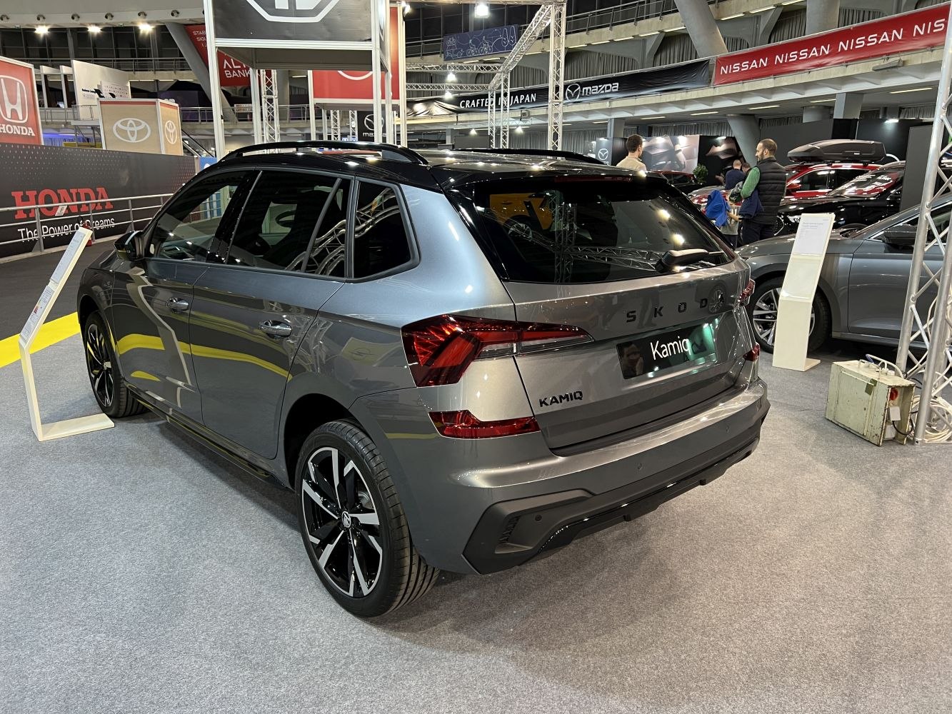 Rear view with modern taillights and sporty alloy wheels
