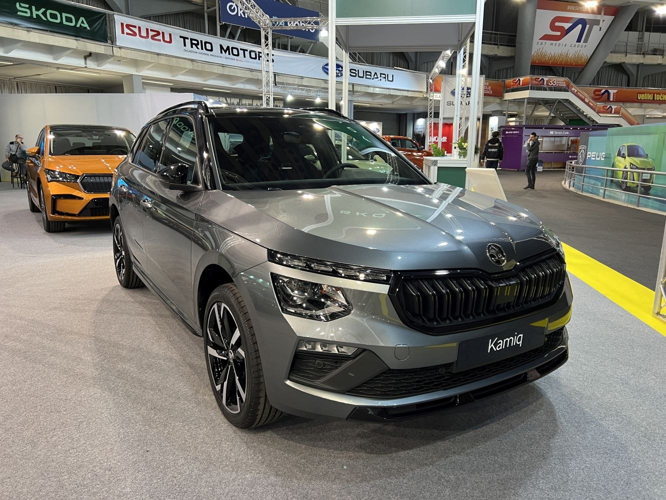 Front view of a compact SUV with sleek headlights and blacked-out grille