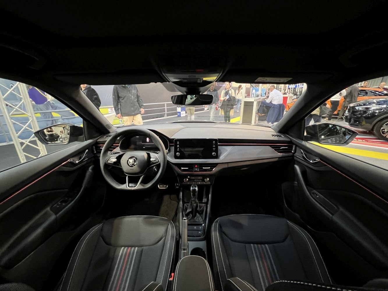 Modern compact SUV interior with digital dashboard and touchscreen infotainment