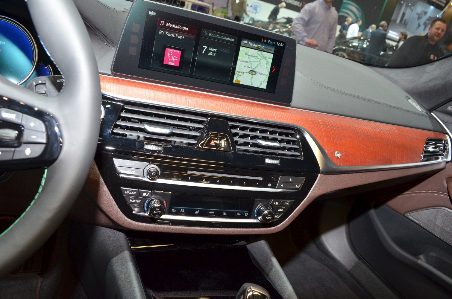 Dashboard with infotainment screen and wood trim