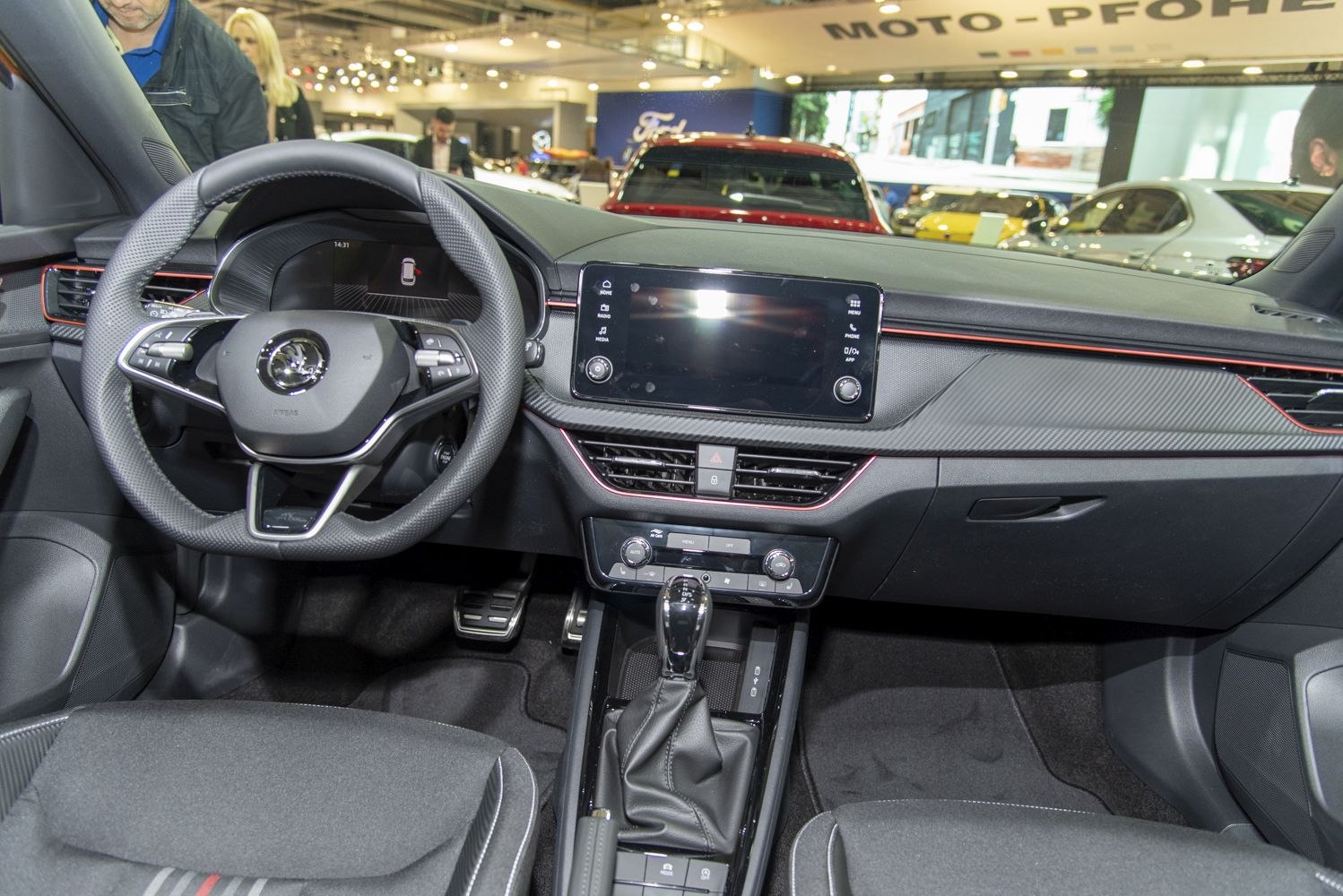 Digital dashboard and touchscreen central console with multifunction steering wheel