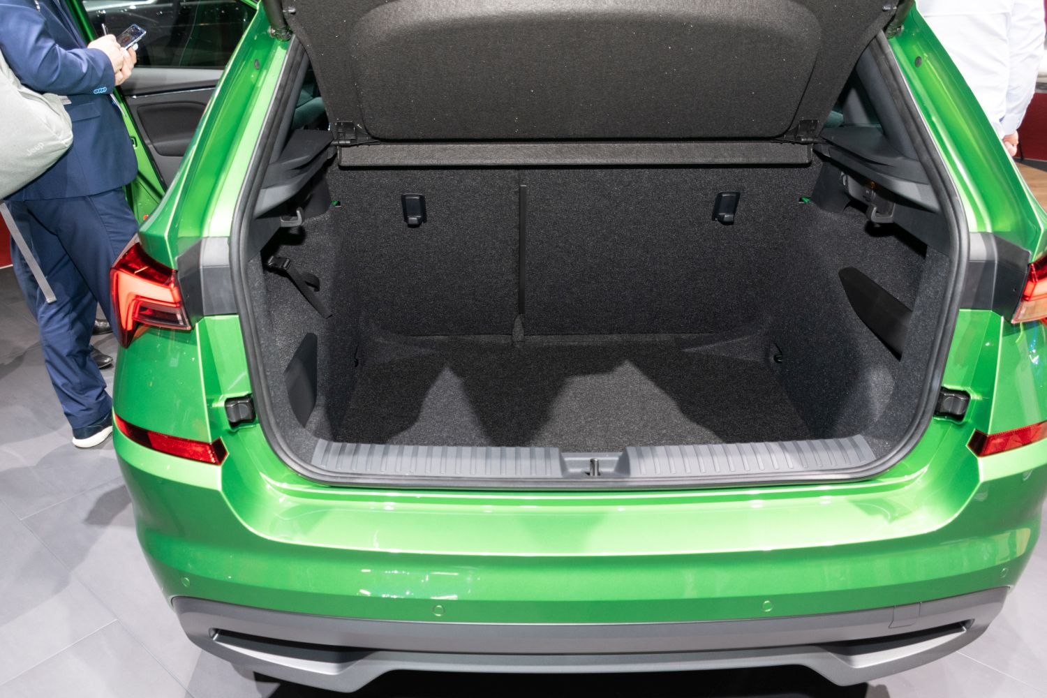 Spacious, carpeted trunk interior with wide opening and clean edges