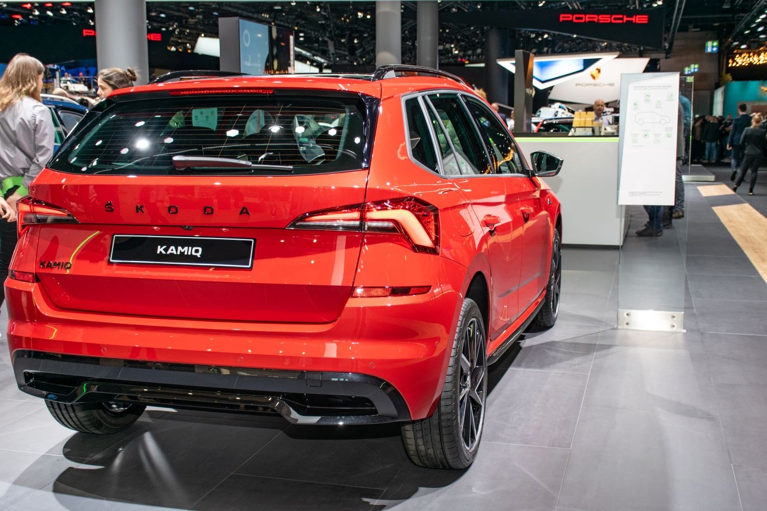 Rear view of red vehicle with LED taillights and alloy wheels