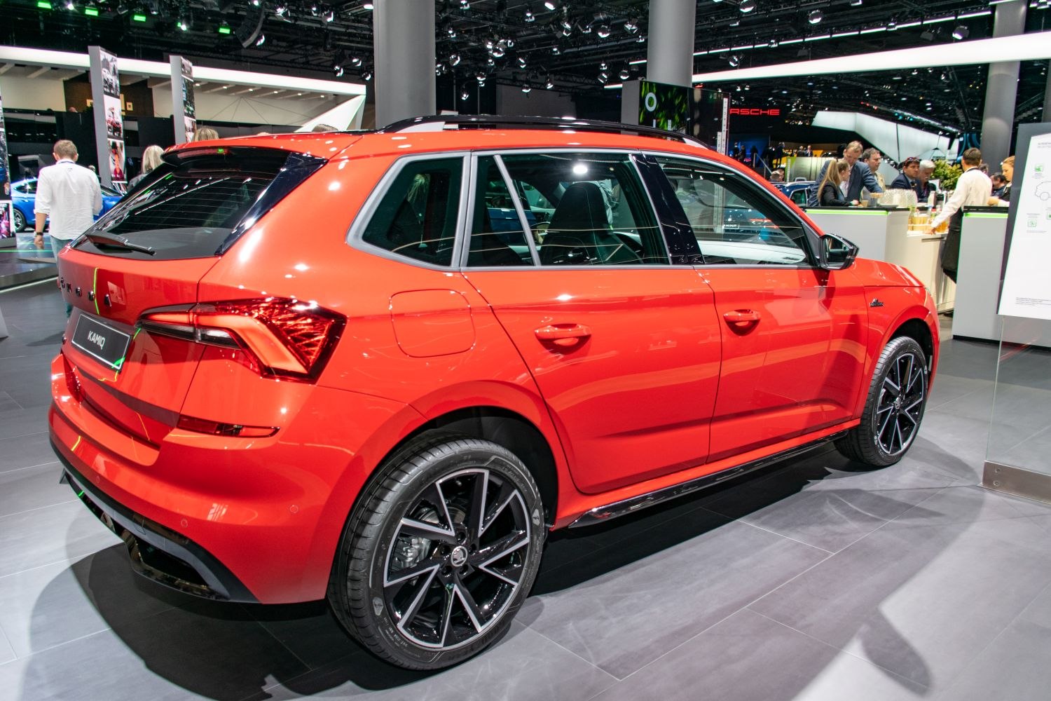 Rear-side view with black multi-spoke alloy wheels