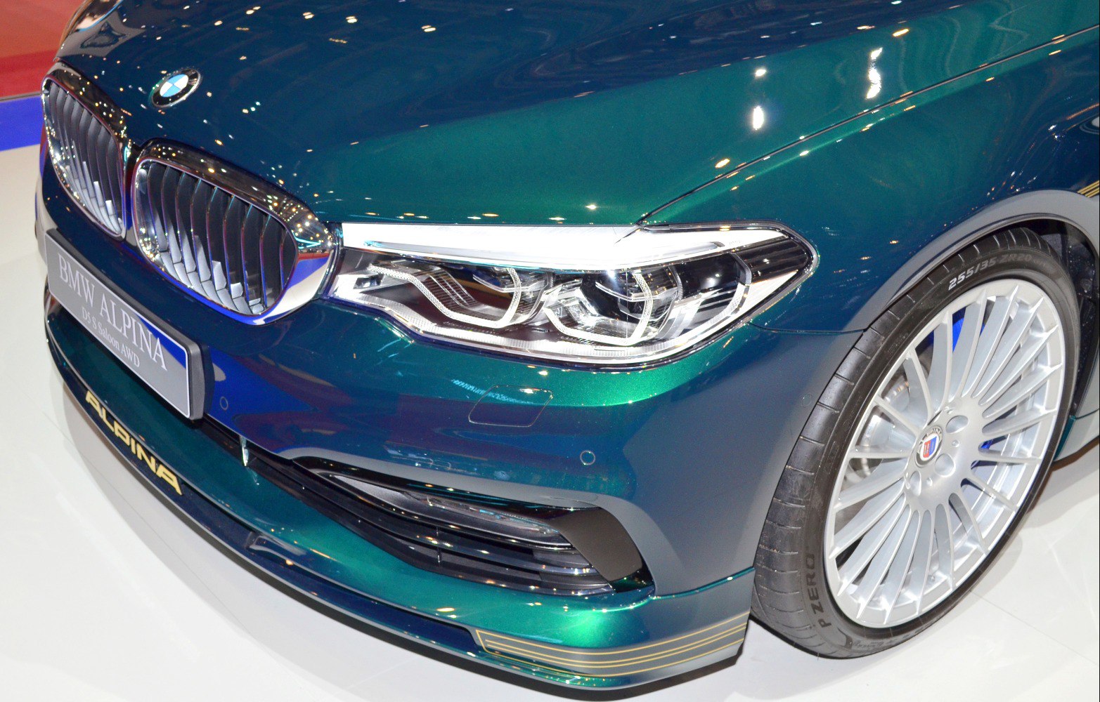 Front end with kidney grille, LED headlights, and multi-spoke alloy wheel.