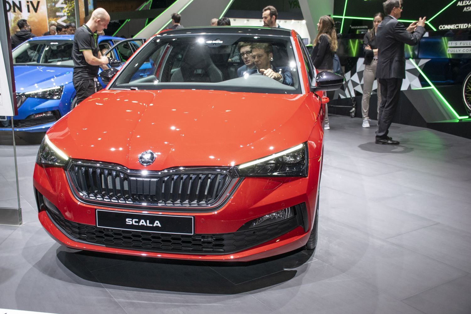 Front view with LED headlights and black grille
