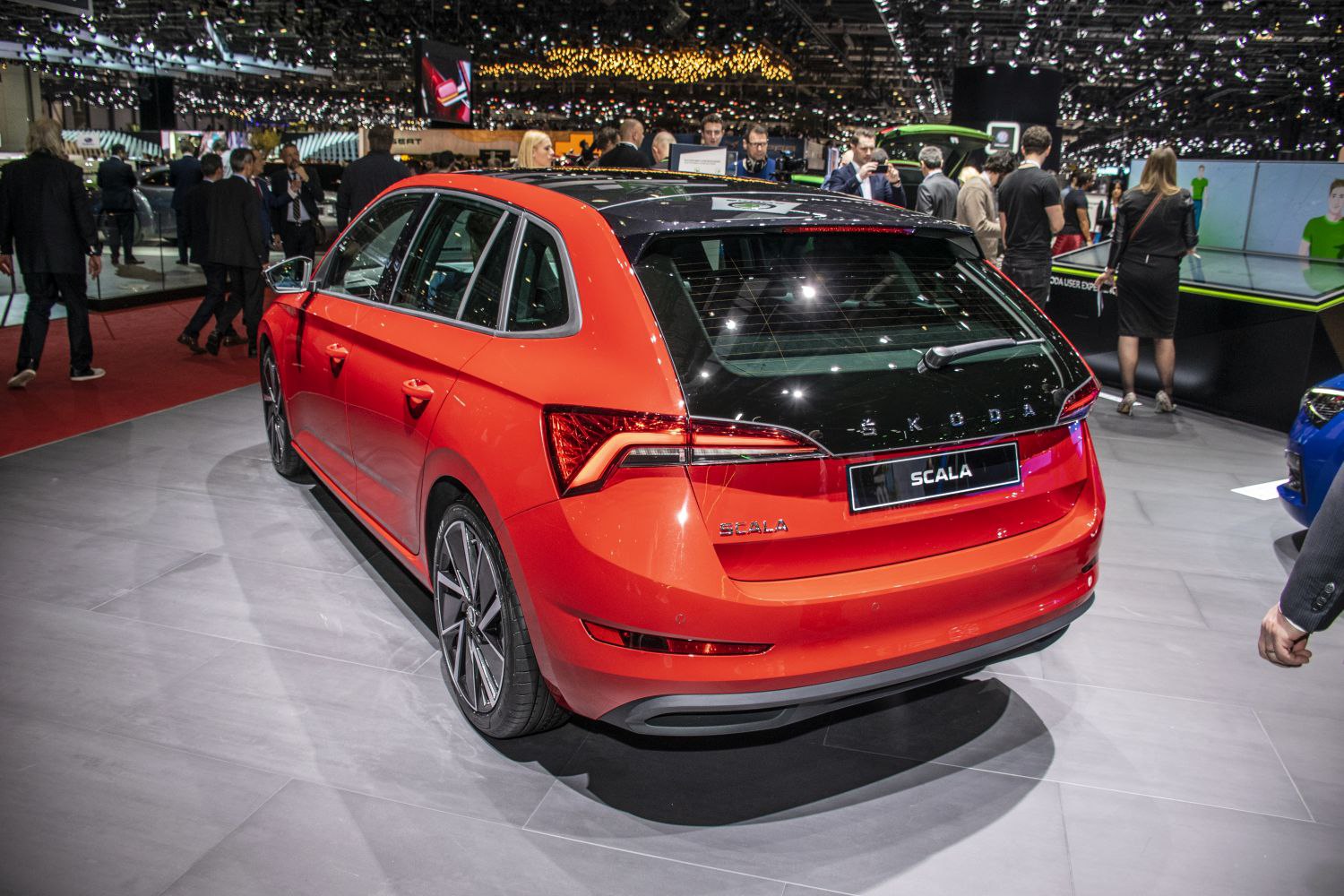 Rear view of a dual-tone hatchback with LED tail lights