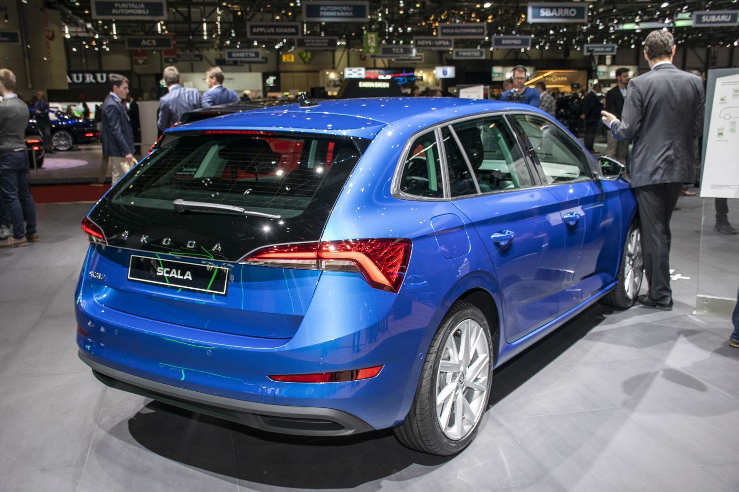 Rear view of blue hatchback with LED tail lights and alloy wheels