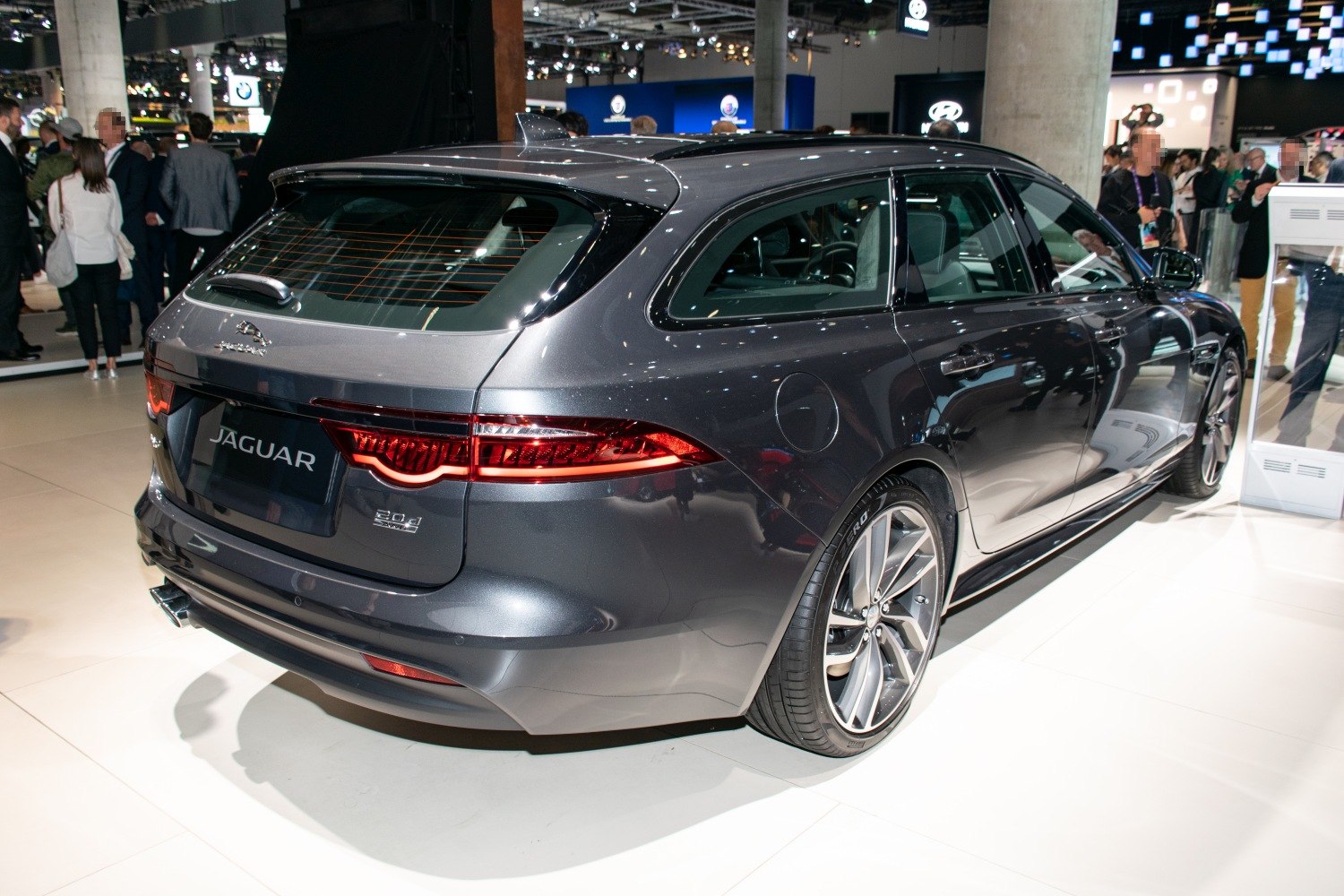 Rear side of sleek station wagon with modern tail lights.