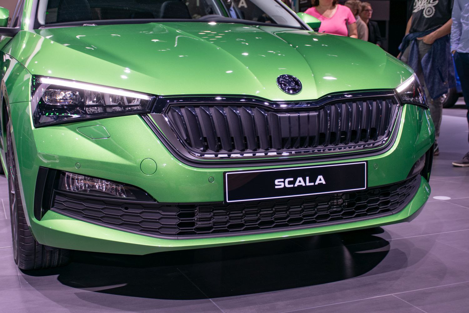 Front grille, headlights, and lower bumper design in green