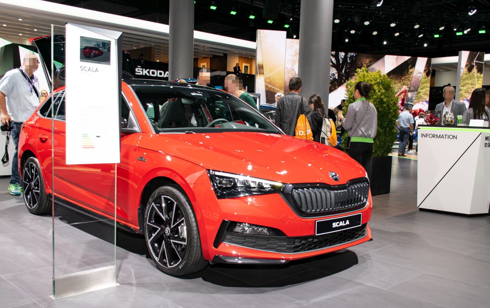 Sleek front view with sharp headlights and sporty alloy wheels