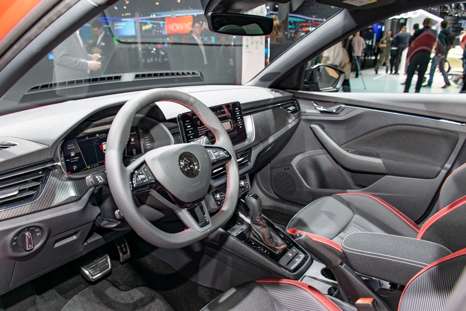 Modern car interior with dashboard and steering wheel