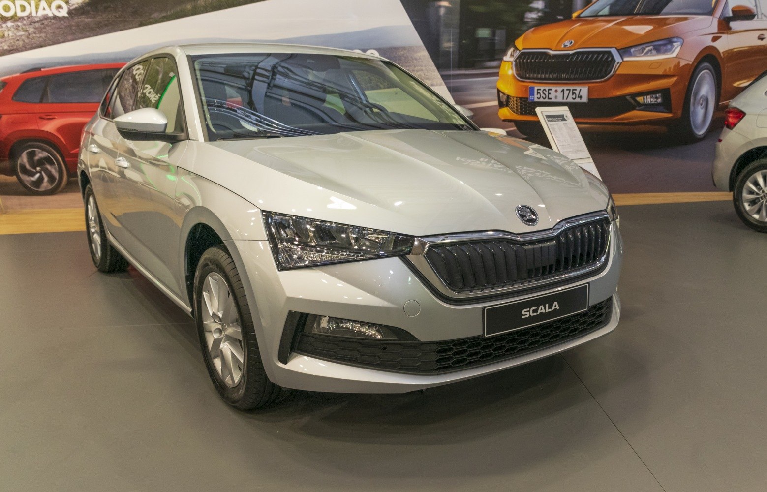 Front-angle view with LED headlights and bold grille
