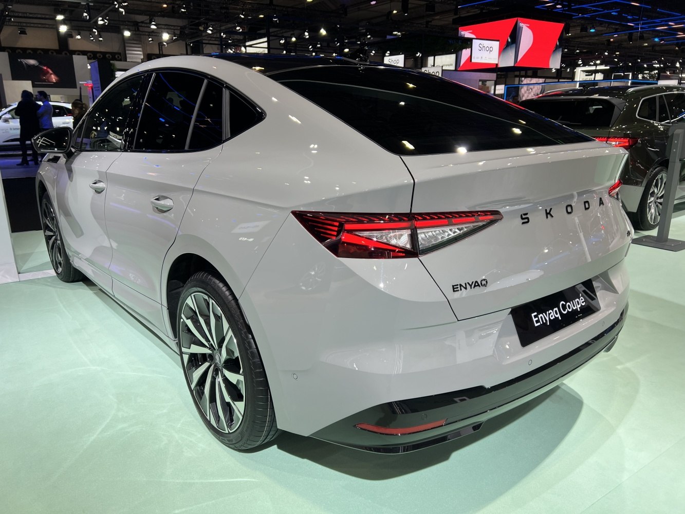 Rear view with sleek taillights and multi-spoke alloy wheels