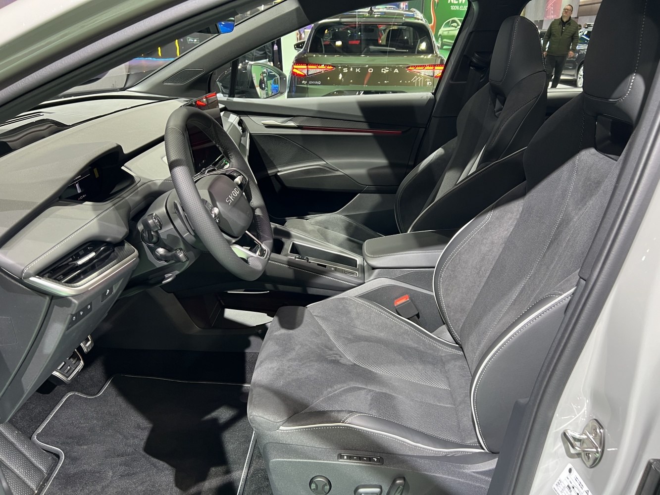 Modern dashboard and sporty front seats with premium materials