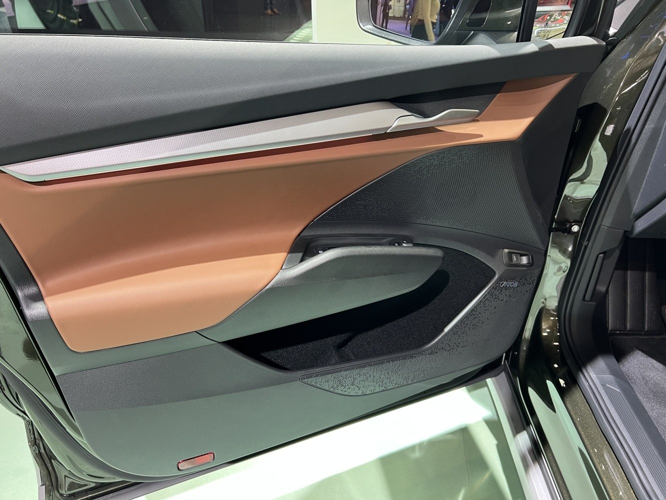 Door panel interior with premium materials and modern design