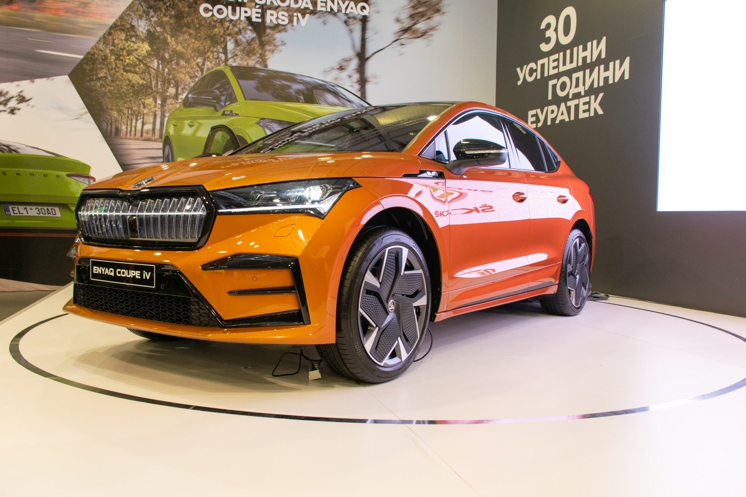 Front view of an electric SUV with distinctive grille and aerodynamic design