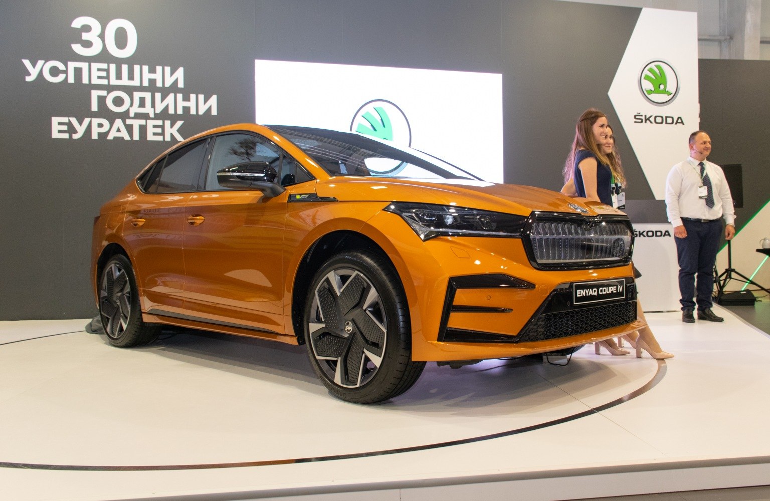 Sleek front grille, LED headlights, aerodynamic coupe silhouette