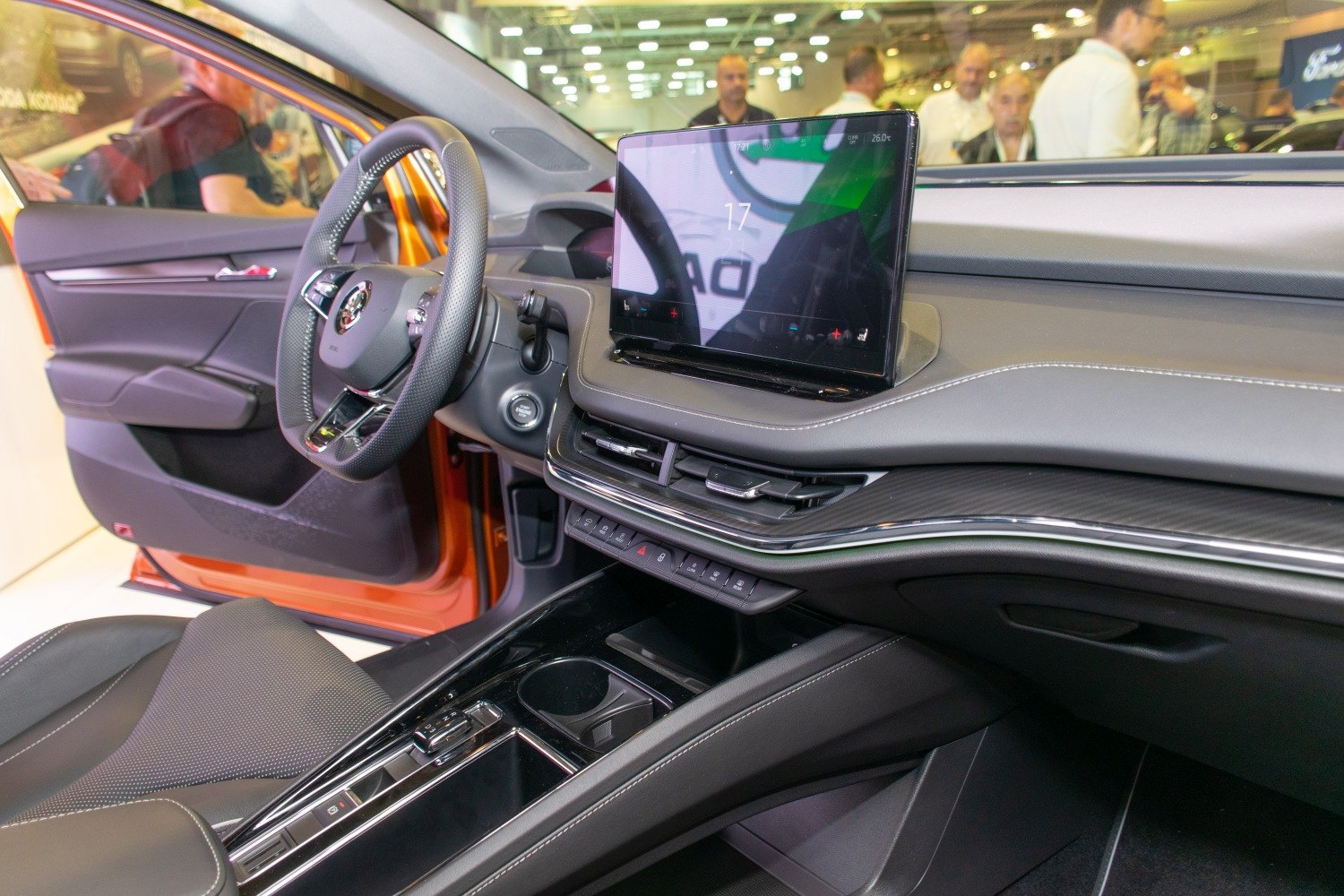 Modern car interior with large touchscreen and sleek dashboard