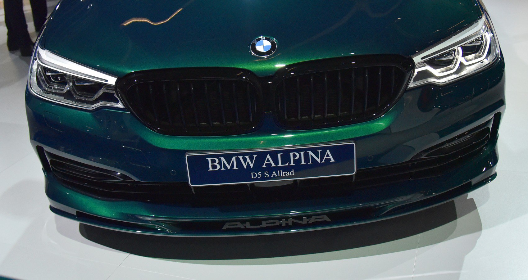 Front grille and LED headlights on a luxury sedan