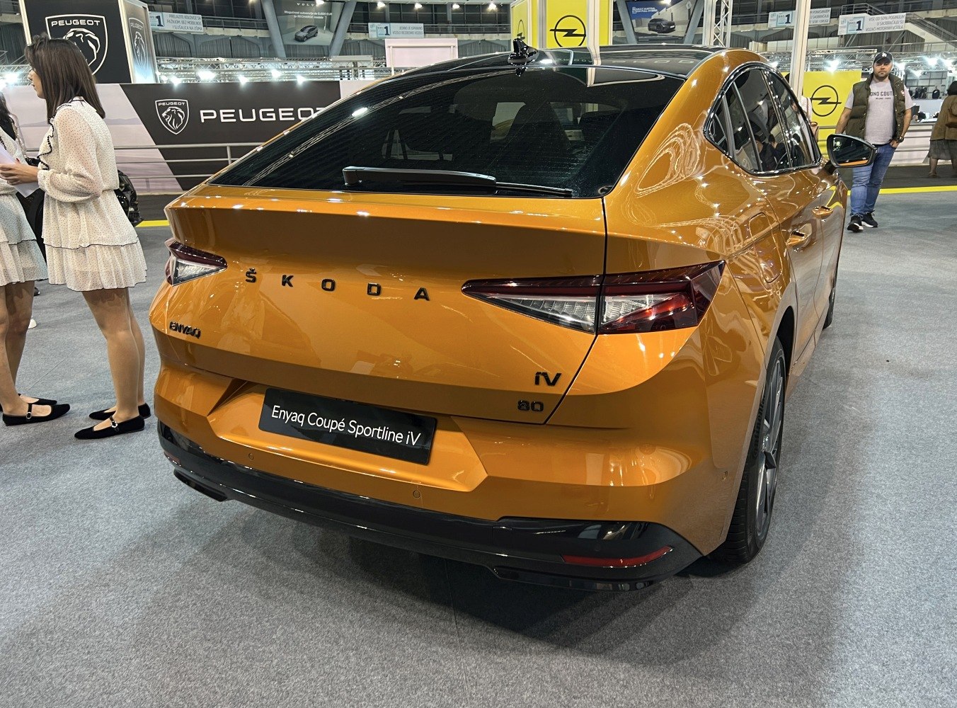 Rear view with sleek taillights and sporty spoiler