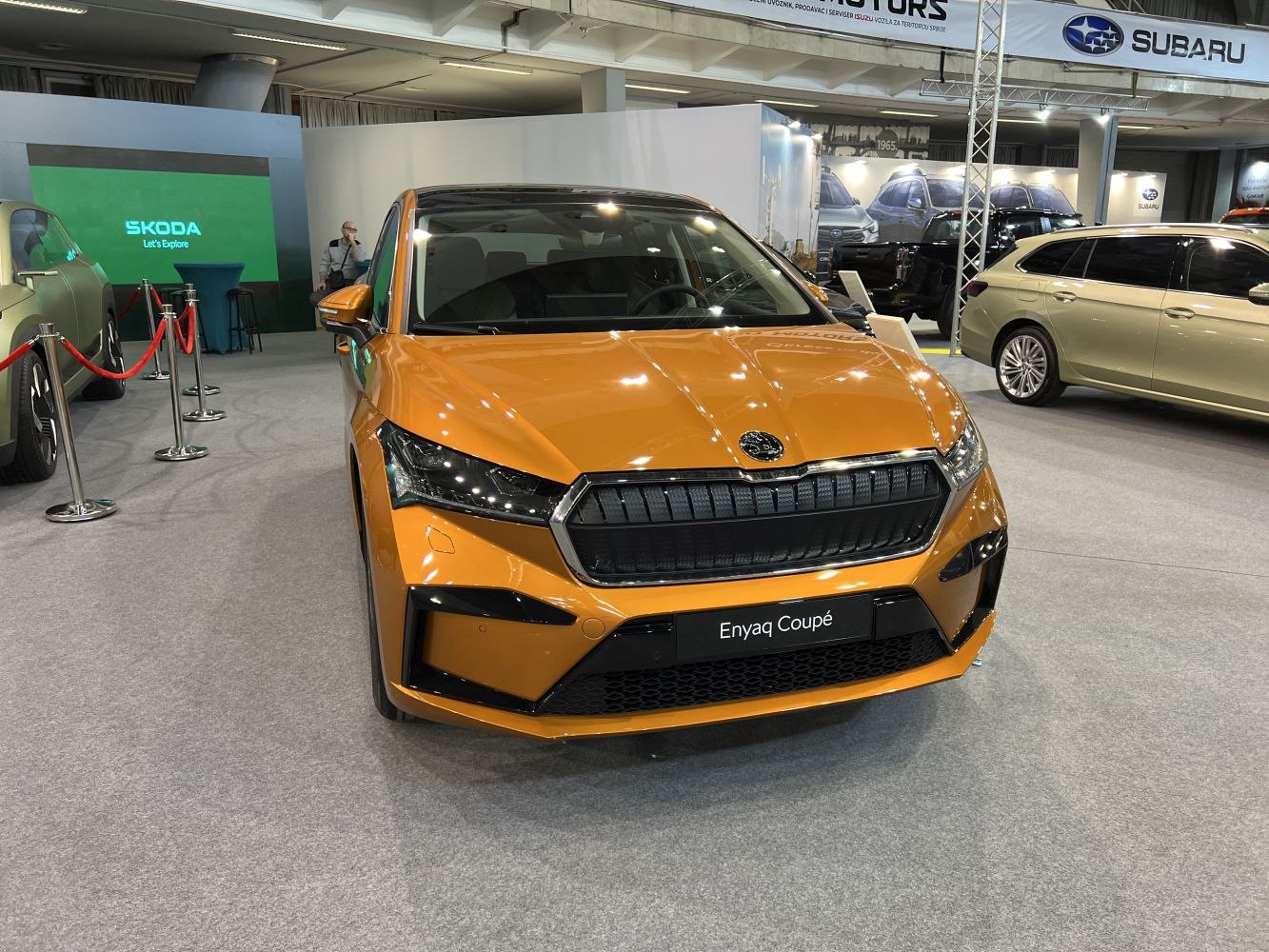 Front view of a sleek SUV with bold grille and LED headlights