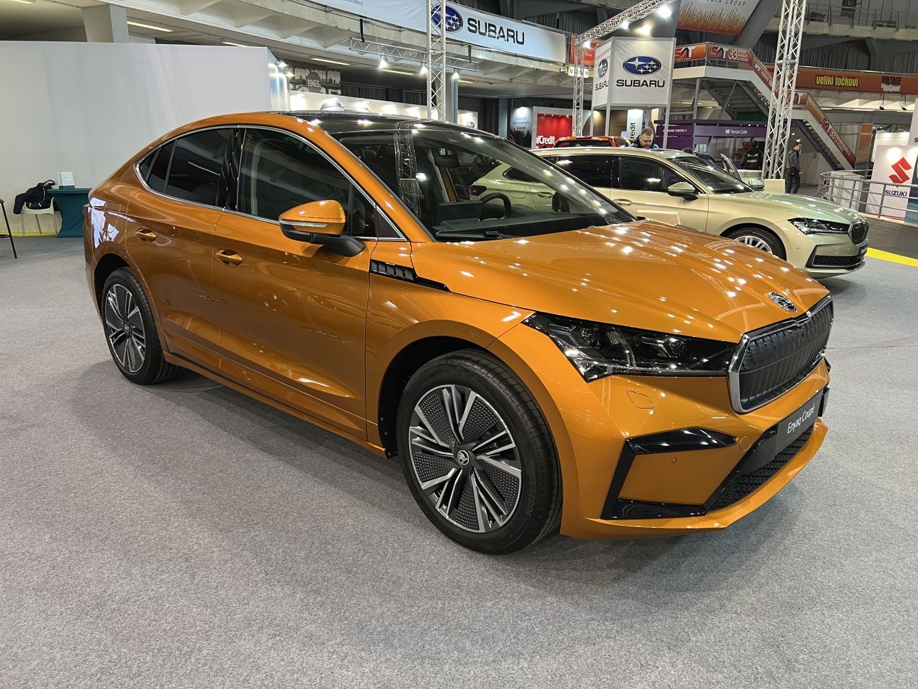 Aerodynamic wheels and sharp LED headlights on electric coupe