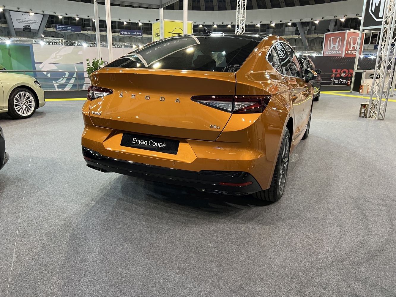 Rear view of a modern electric coupé SUV with sharp tail lights