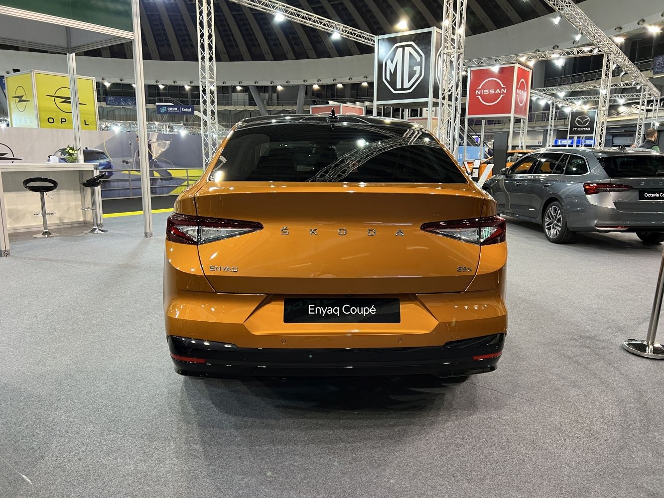 Rear view of modern electric SUV with sleek angular taillights.