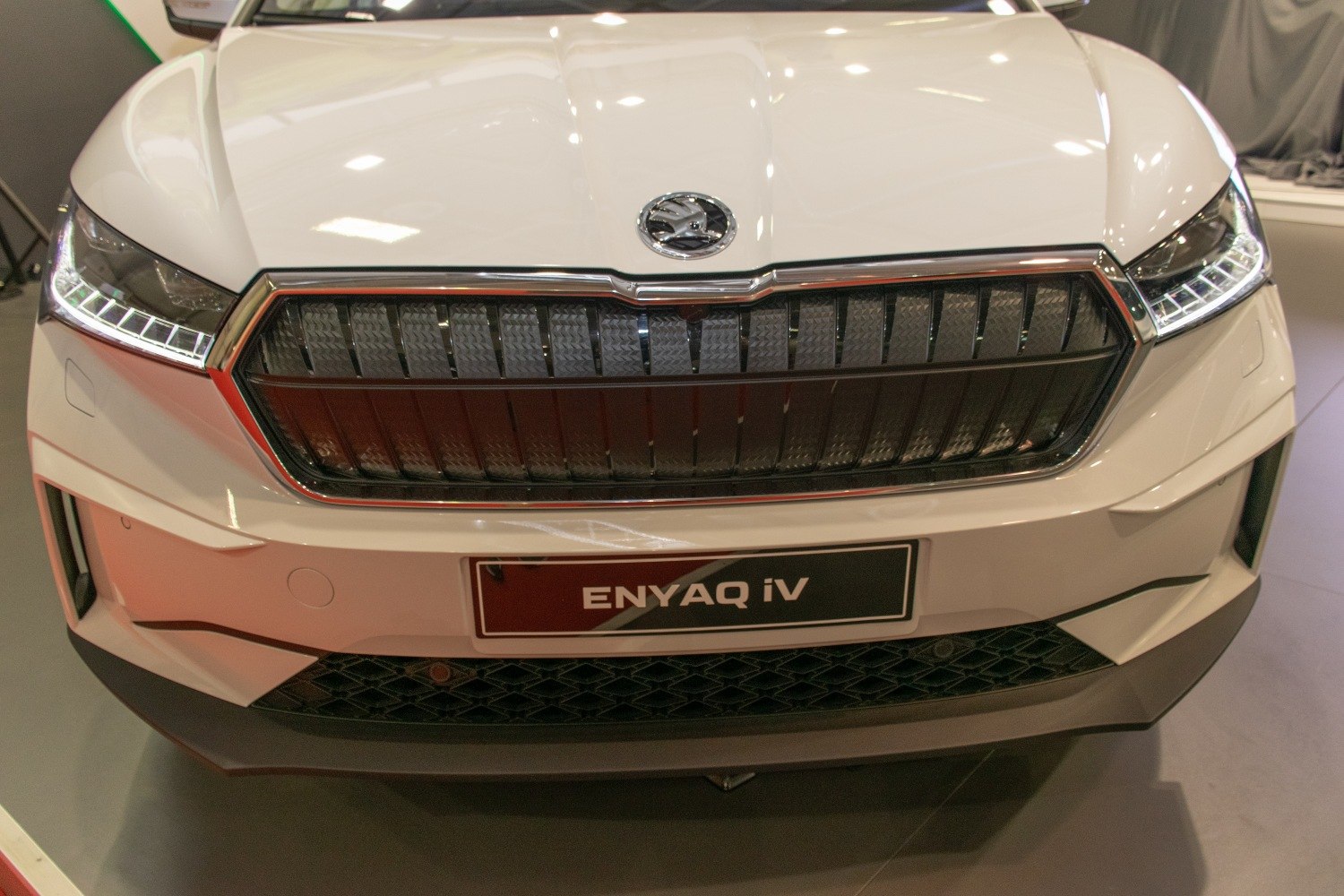 Close-up of front grille and LED headlights with Skoda emblem