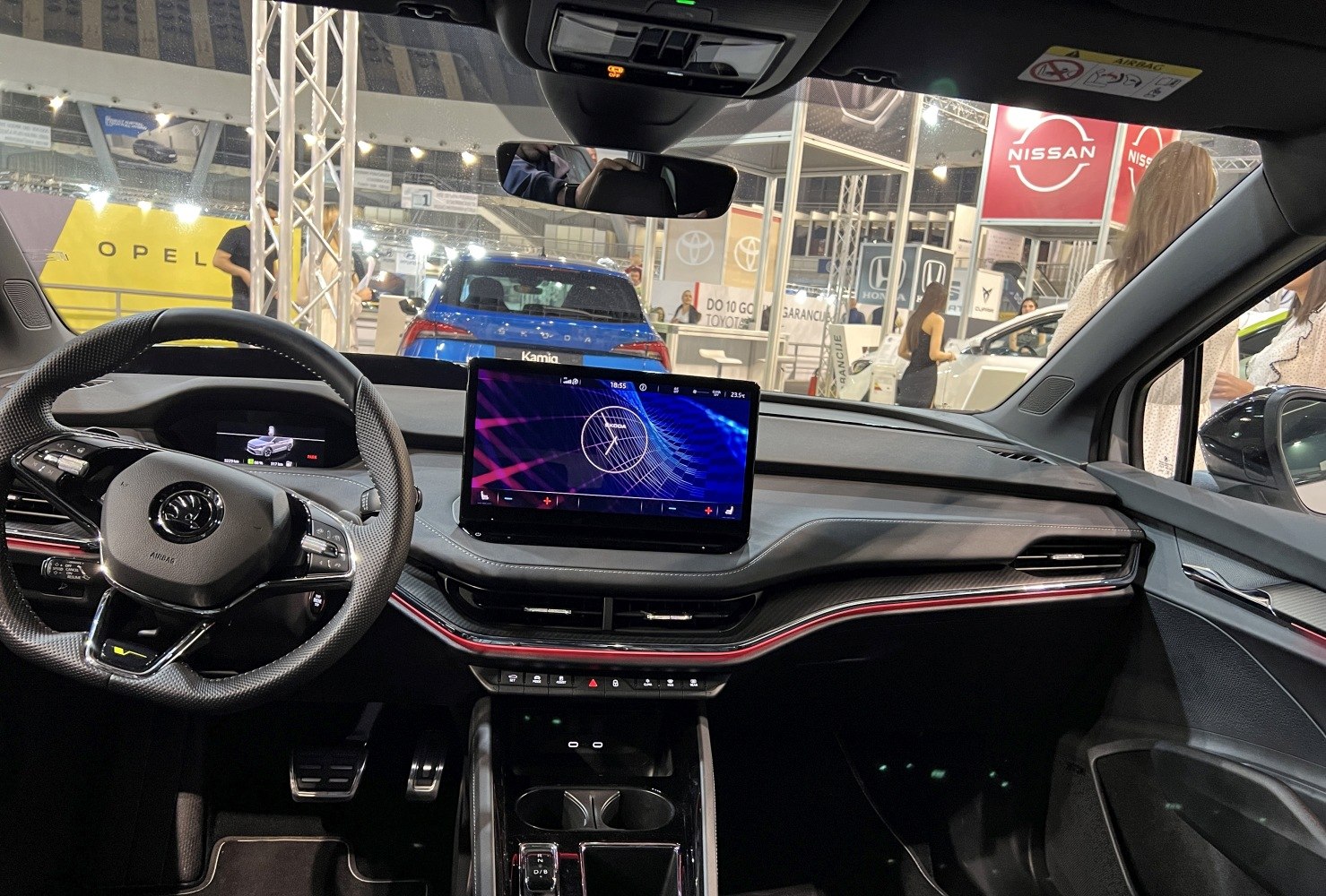 Digital dashboard with infotainment screen and modern steering wheel