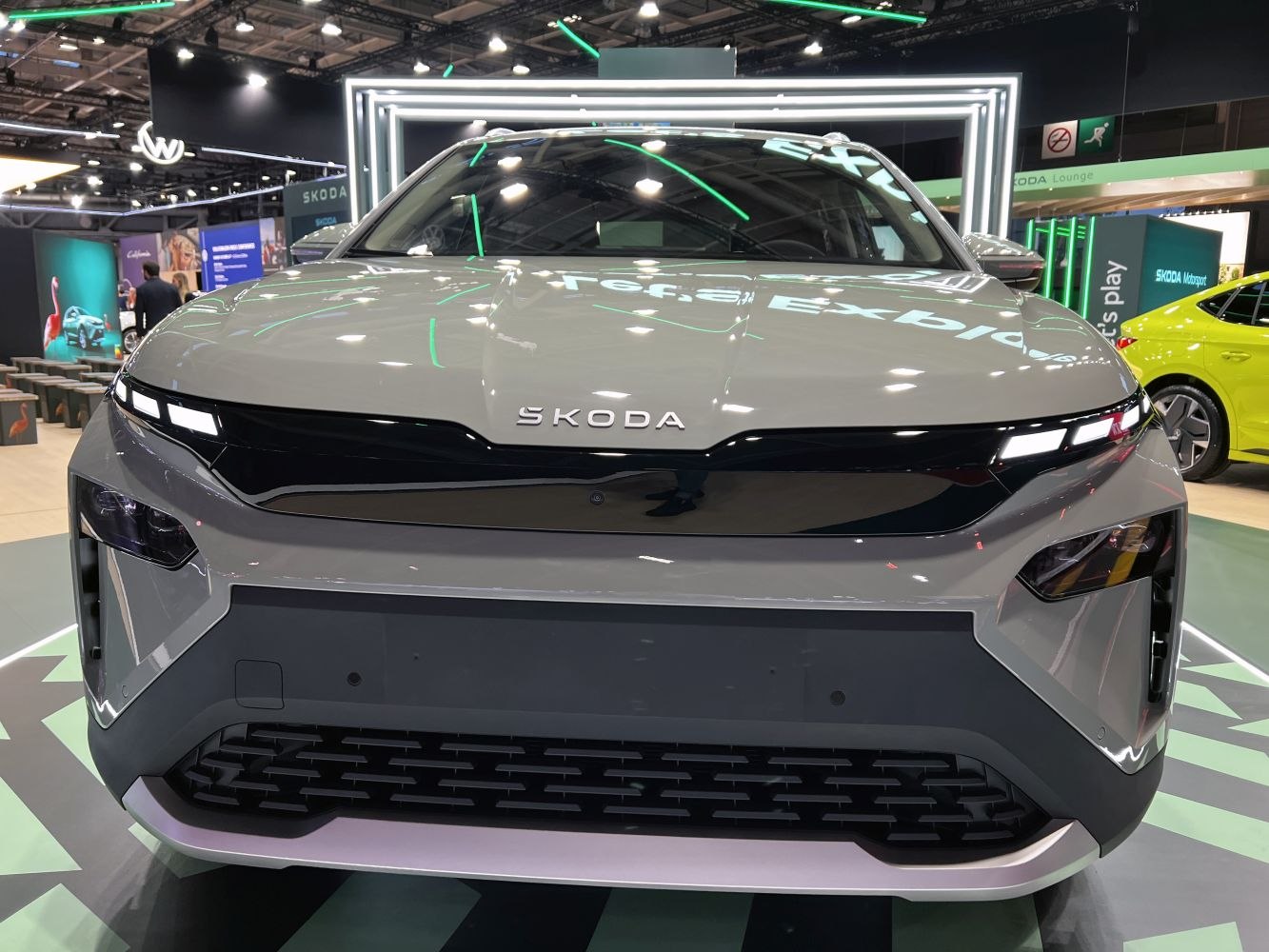 Front view with sleek LED headlights and black front panel