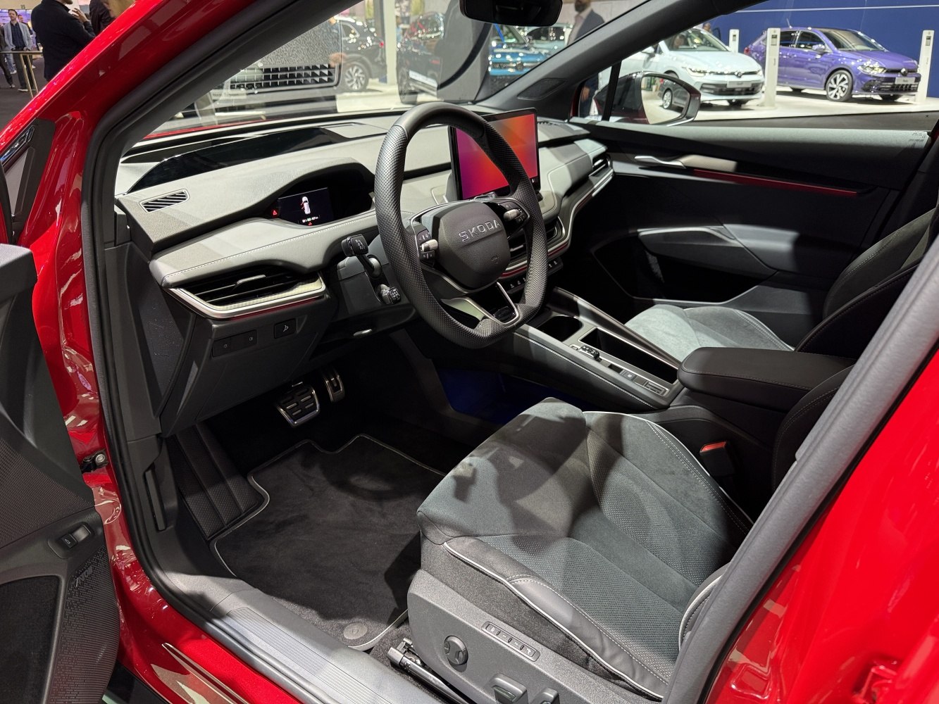 Digital dashboard and touchscreen infotainment with ergonomic steering wheel