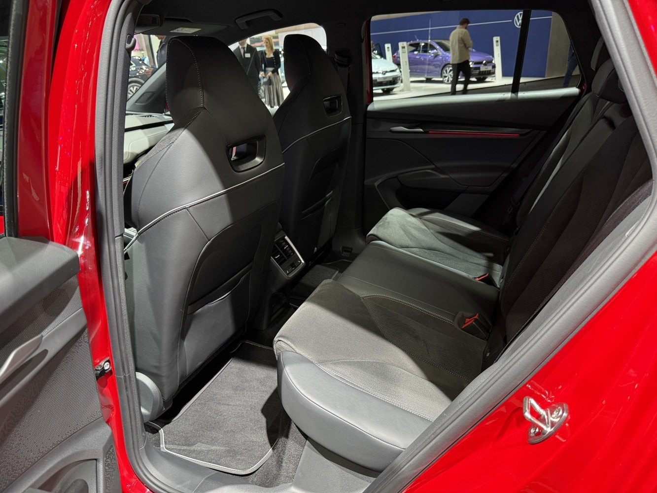 Rear seat interior with black upholstery and door panel details