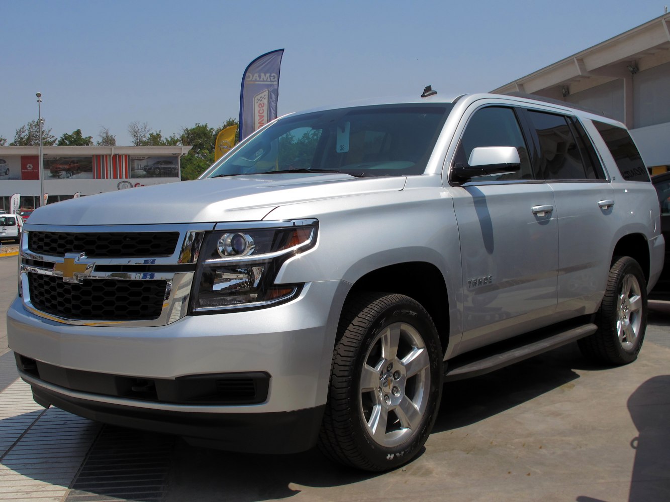 Front side exterior view with grille and headlight details