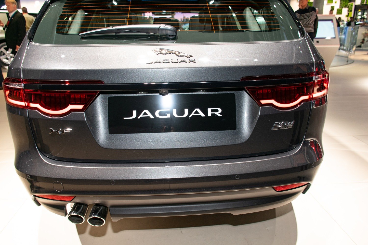 Jaguar XF Sportbrake rear view with LED tail lights and dual exhaust pipes