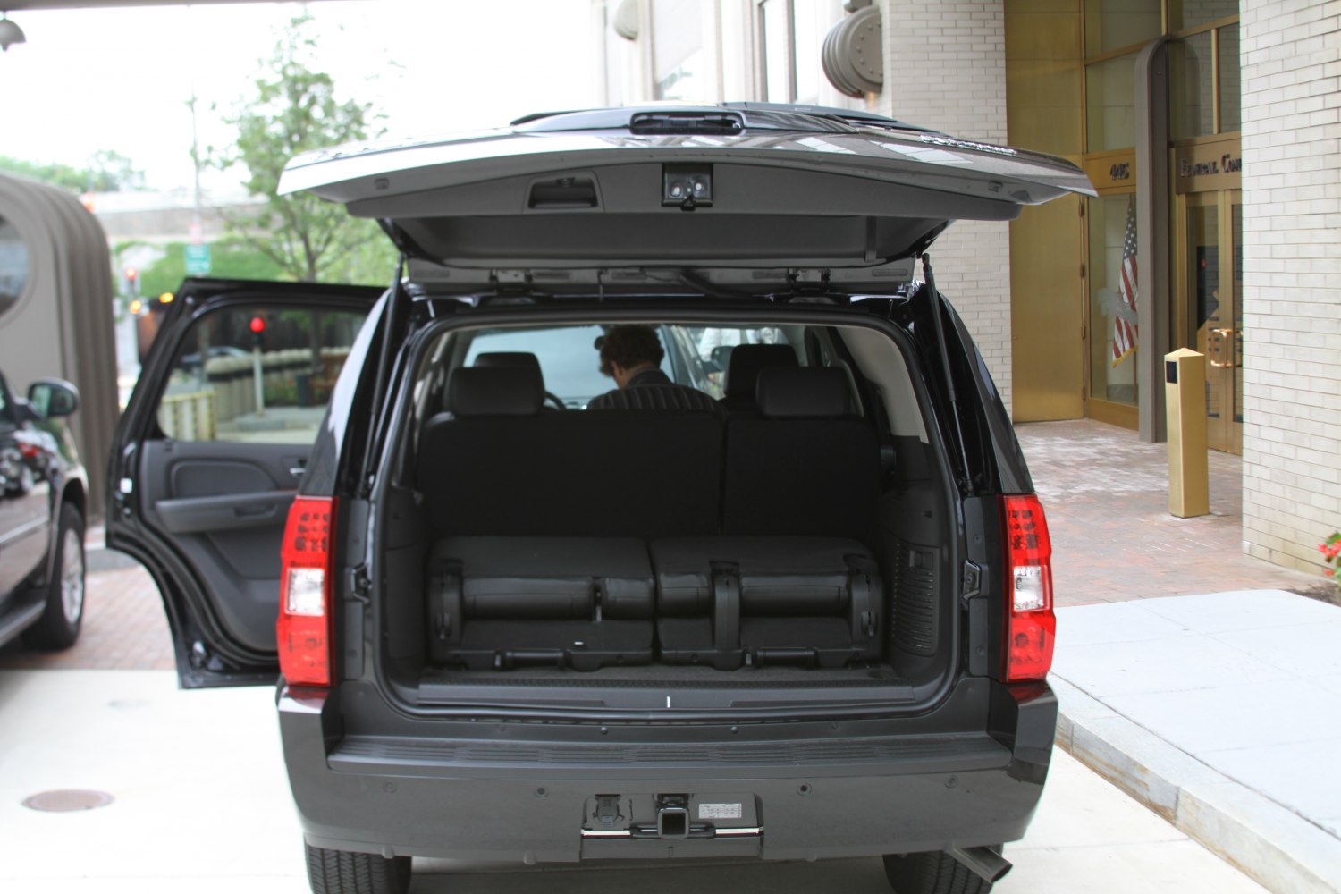 Open rear cargo area with liftgate and folded seats