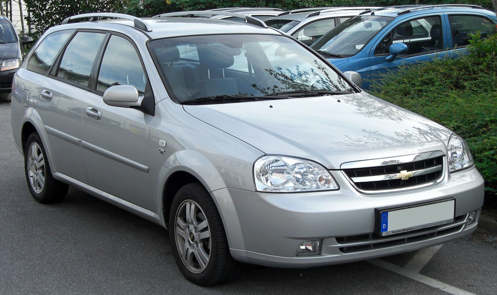 Silver station wagon with roof rails and alloy wheels