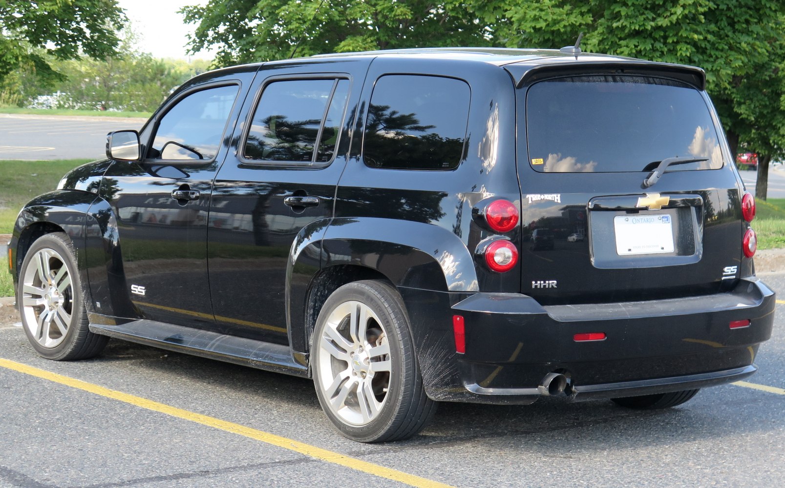 Rear-side view showing SS badge and tinted windows