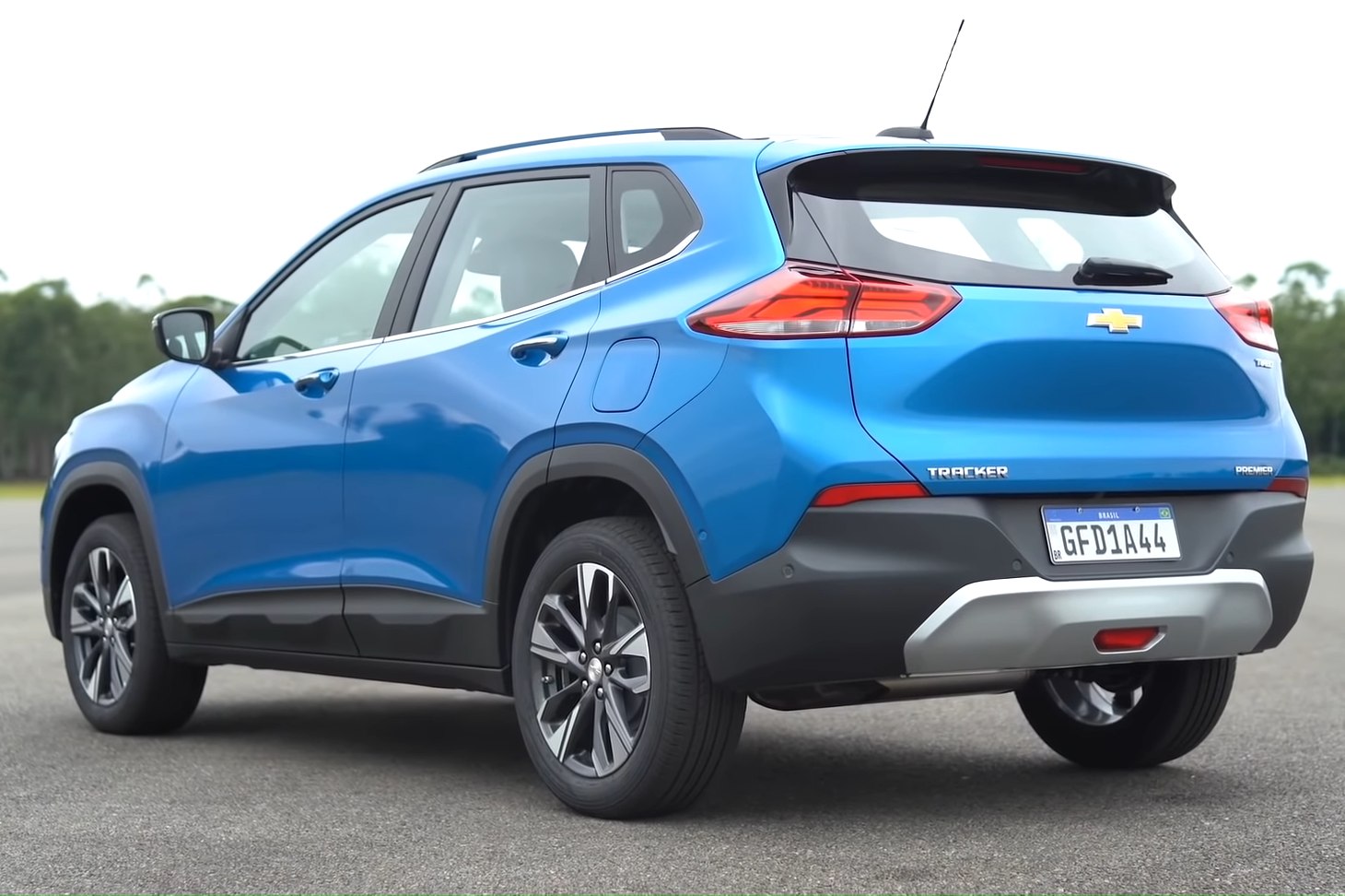 Blue compact SUV rear and side view with alloy wheels and distinctive taillights