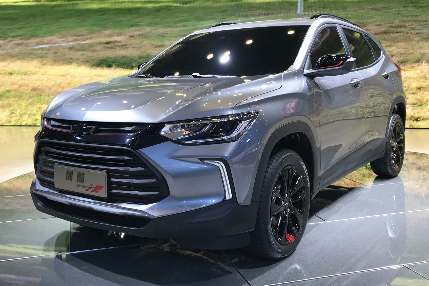 Front three-quarter view with LED headlights and black alloy wheels
