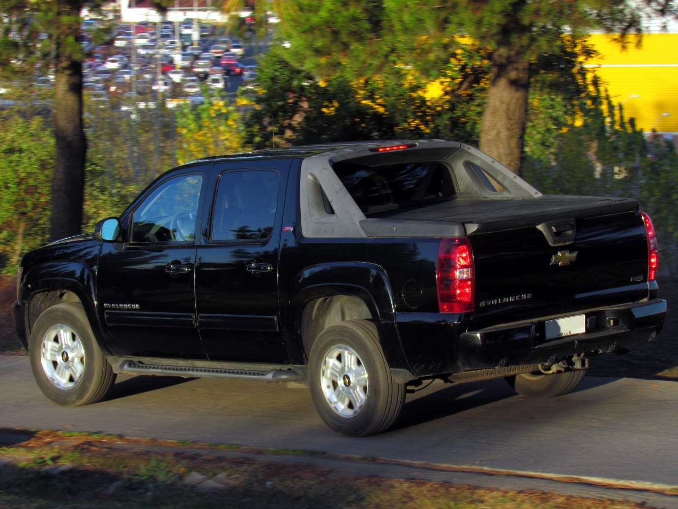 Black 2007 double cab pickup truck with rear view and Z71 badge