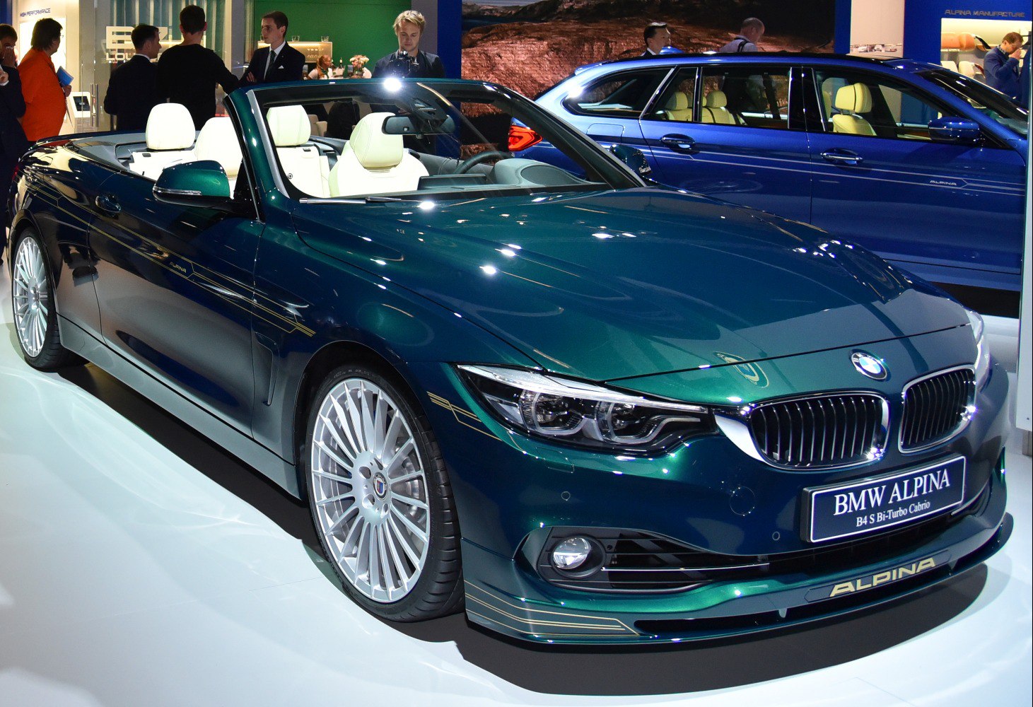 Convertible with Alpina multi-spoke wheels and elegant dark green body