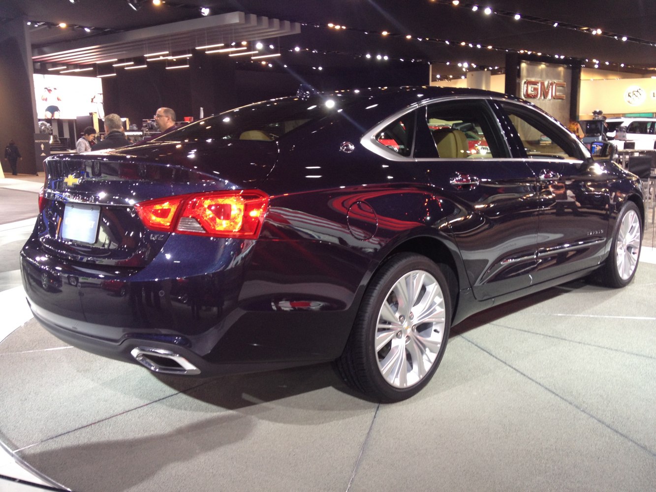 Rear side profile with LED tail lights and dual exhaust tips