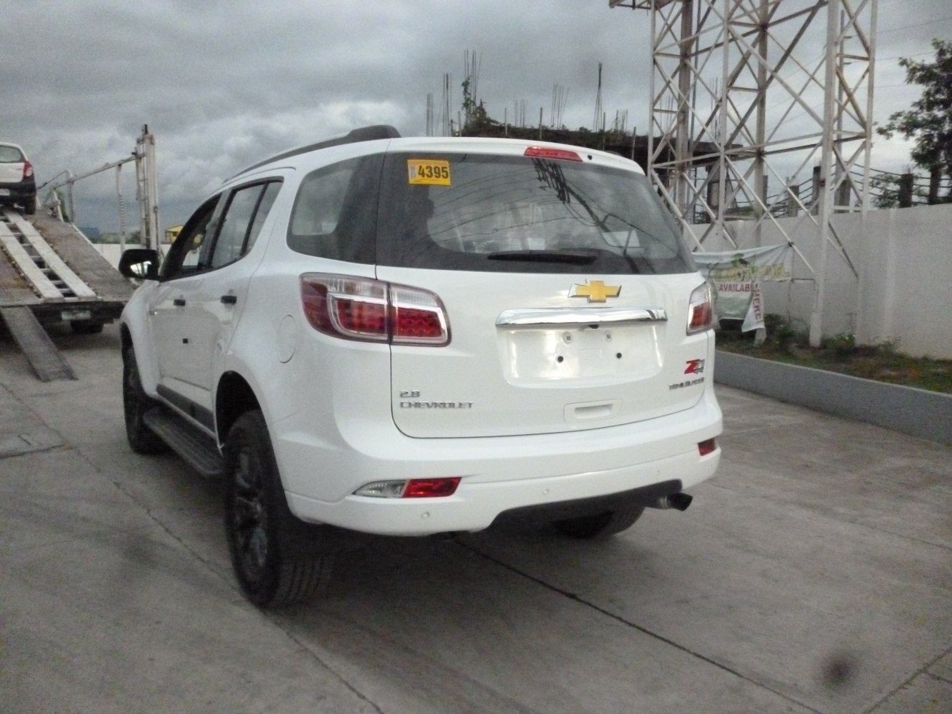 Rear view with distinctive taillights and badge details